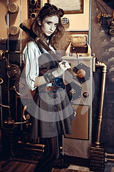 Portrait of a beautiful steampunk woman, with a telescope on a g