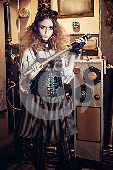 Portrait of a beautiful steampunk woman, with a telescope and pr