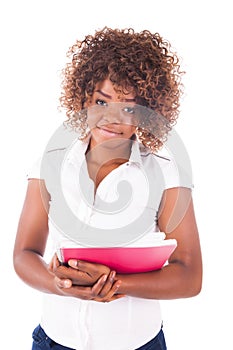 Portrait of beautiful student girl with books