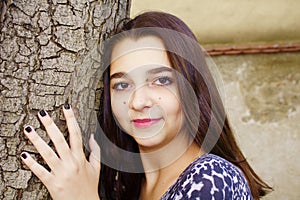 Portrait of a beautiful teen girl with dark hair