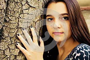 Portrait of a beautiful teen girl with dark hair