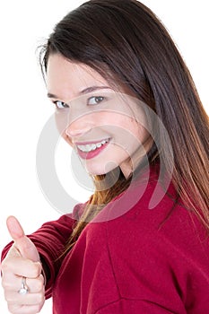 Portrait of a beautiful teen girl with thumb up gesture