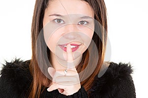 Portrait of a beautiful teen with thumb up gesture