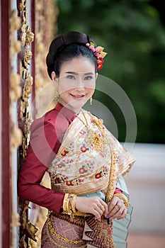 Portrait of a beautiful thai woman wearing a thai dress
