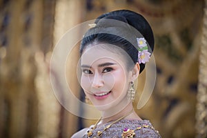 Portrait of a beautiful thai woman wearing a thai dress