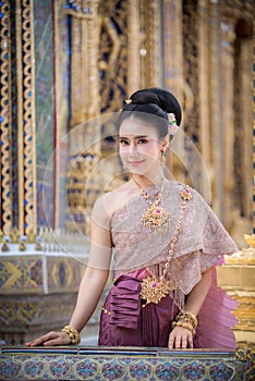 Portrait of a beautiful thai woman wearing a thai dress