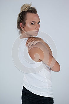 Portrait of beautiful transgender woman looking over shoulder