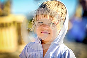 Portrait of a beautiful two year old baby girl with blonde hair