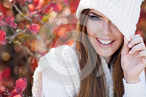 Portrait of beautiful woman in autumn Park