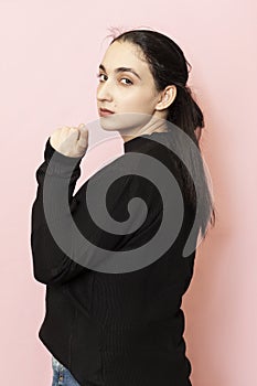 Portrait of a beautiful woman in casual clothing calling with handgesture. Come here, Come on, Let`s go signs