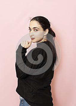 Portrait of a beautiful woman in casual clothing calling with handgesture. Come here, Come on, Let`s go signs