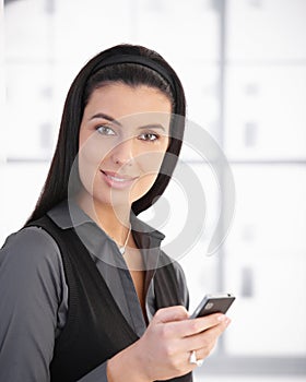 Portrait of beautiful woman with cellphone