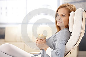 Portrait of beautiful woman drinking tea