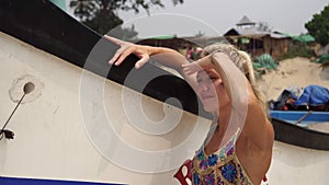 Portrait of a beautiful woman in ethnic dress on a beach in Goa India