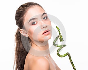 Portrait beautiful woman face portrait with green leaf , concept for skin care or organic cosmetics