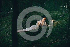 Portrait of a beautiful woman in the forest