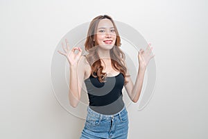 Portrait beautiful woman with hand show ok or agree hand sign