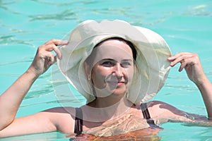 Portrait of a beautiful woman in hat