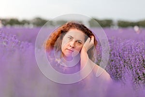 Portrait of beautiful woman on the lavender field