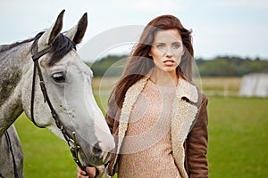 Portrait beautiful woman long hair next horse