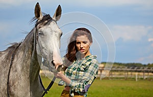 Portrait beautiful woman long hair next horse