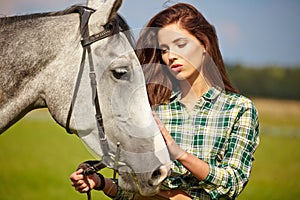 Portrait beautiful woman long hair next horse