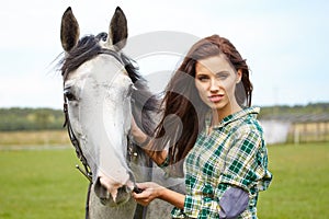 Portrait beautiful woman long hair next horse