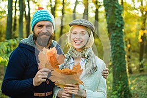 Portrait of beautiful woman and man walking outdoors. Romantic portrait of a sensual couple in love. Fall concept. Hello