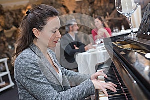 portrait beautiful woman pianist photo