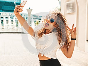 Portrait of beautiful woman posing outdoors