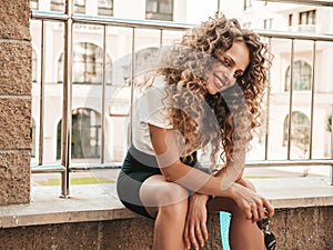 Portrait of beautiful woman posing outdoors