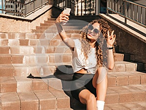 Portrait of beautiful woman posing outdoors