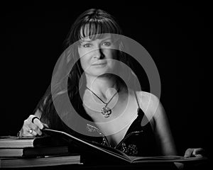 Portrait of a Beautiful Woman Reading Books