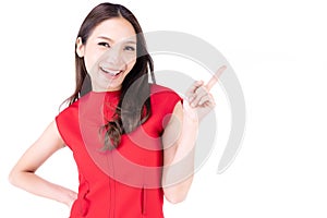 Portrait beautiful woman in a red dress Showing a happy expression and point up on a white background
