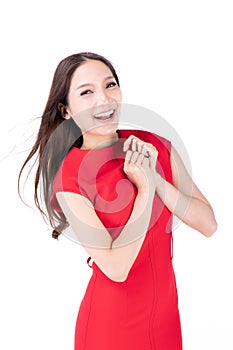 Portrait beautiful woman in a red dress Showing a happy expression On a white background