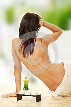 Portrait of Beautiful woman sitting on bamboo mat