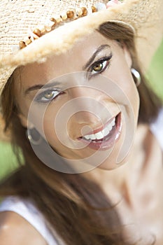 Portrait of Beautiful Woman In Straw Cowboy Hat