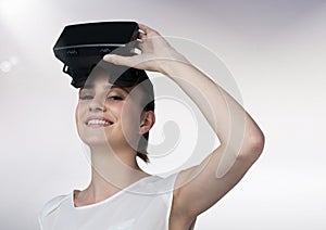 Portrait of beautiful woman using virtual reality headset