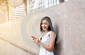 Portrait beautiful woman walking in the city,Happy and smiling,Outdoor lifestyle,Female with positive attitude expressing energy i