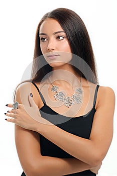 Portrait of beautiful woman wearing luxury silver Jewelery. Neck