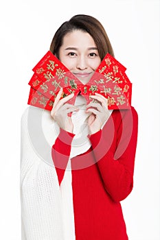 Portrait of beautiful woman wearing red dress against