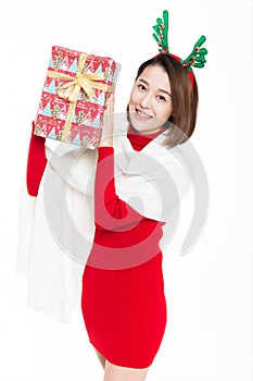 Portrait of beautiful woman wearing red dress against