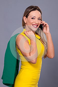 Portrait of beautiful woman in yellow dress