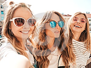 Portrait of beautiful women posing outdoors