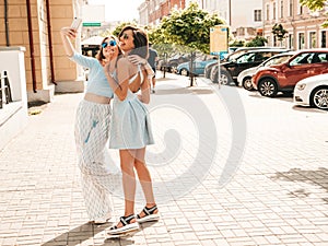 Portrait of beautiful women posing outdoors