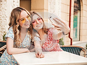 Portrait of beautiful women posing outdoors