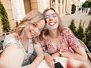 Portrait of beautiful women posing outdoors