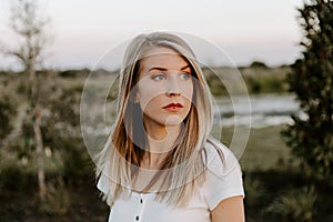 Portrait of Beautiful Young Adult Professional Female Woman Fashion Model Person Smiling Outside at the Park in Nature with Natura