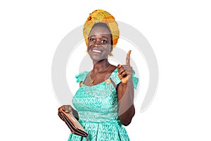Portrait of a beautiful young African woman with wallet, happy