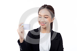 Portrait beautiful young asian business woman hold credit card or debit card for shopping payment.